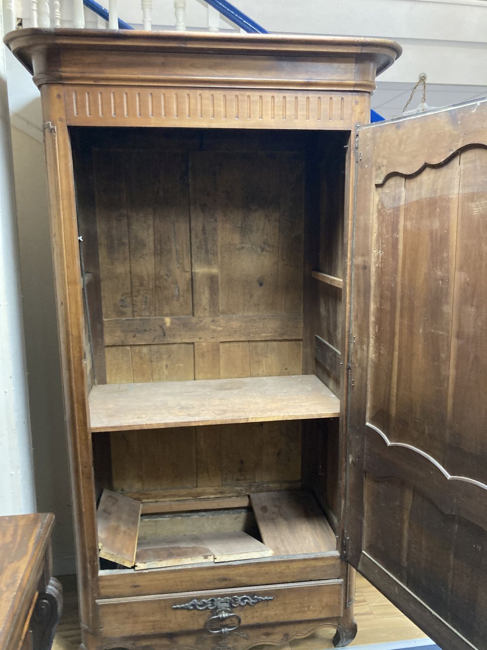 A French 18th century fruitwood single door armoire, width 120cm depth 70cm height 220cm